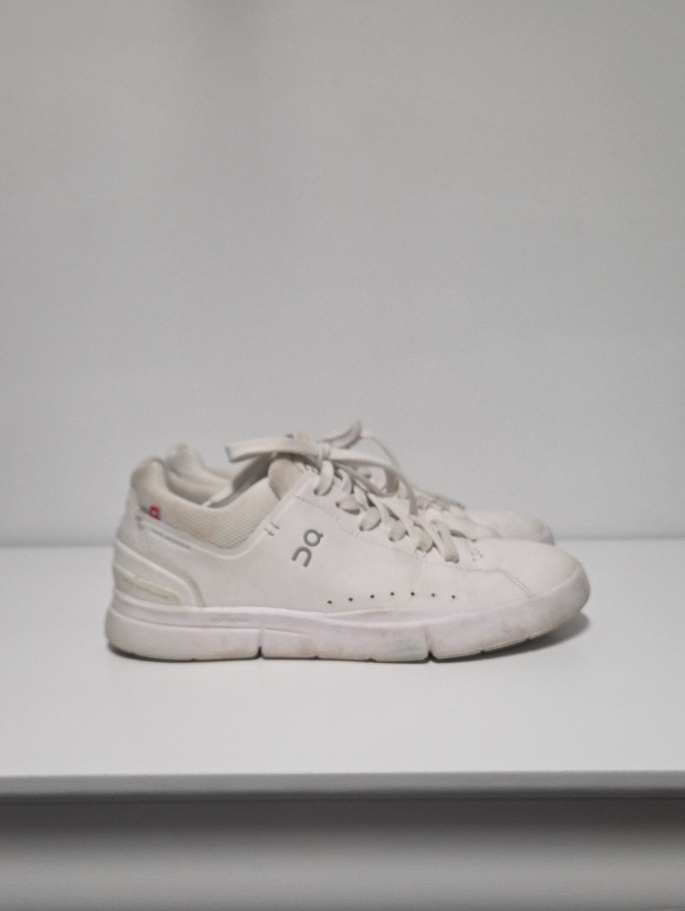 On Running Women's White Low-Top Sneakers with Subtle Gray Logo